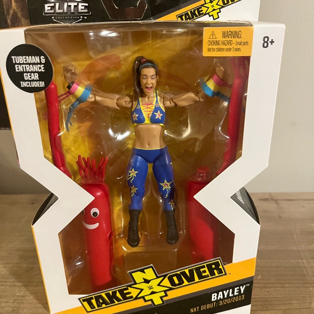 WWE Bayley Elite Figure with Blue and Yellow Attire